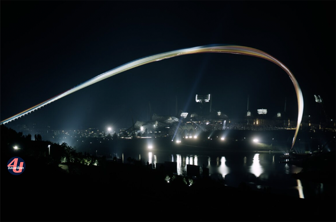 Regenbogeninstallation über dem Olympiasee bei der Abschlussfeier